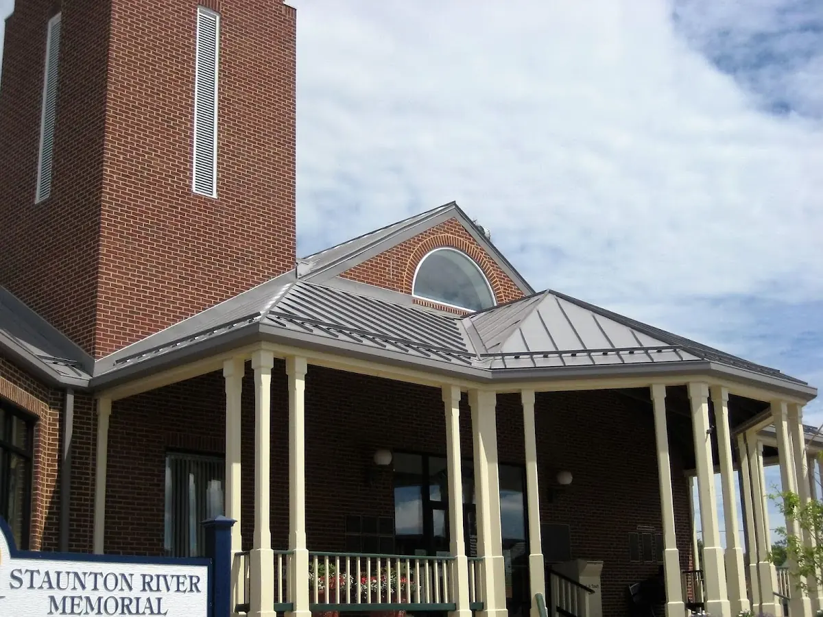 Skilled roofing craftsmen working on a residential roof in Bridgewater